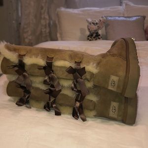Tall Uggs with bows on back